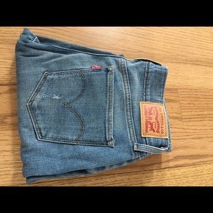Levi’s 711 distressed jeans size 27 blue